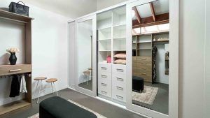 a bedroom with stunning sliding robes doors sunshine coast